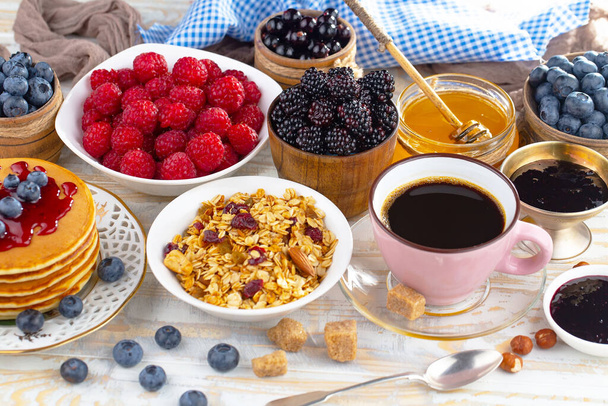 Healthy breakfast on an old background. The concept of tasty and healthy food. - Photo, Image