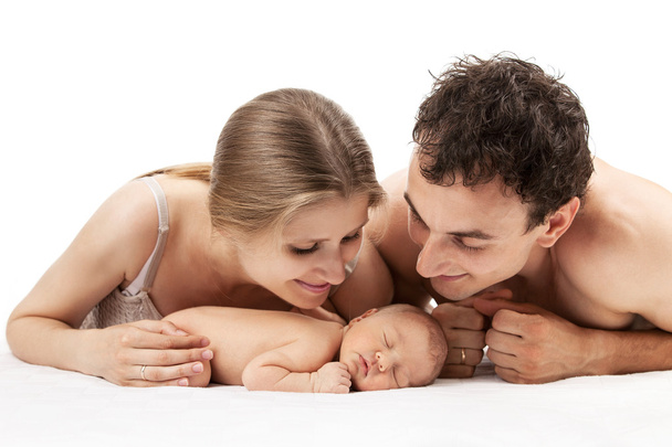 Young caucasian couple with one week old boy - Фото, изображение