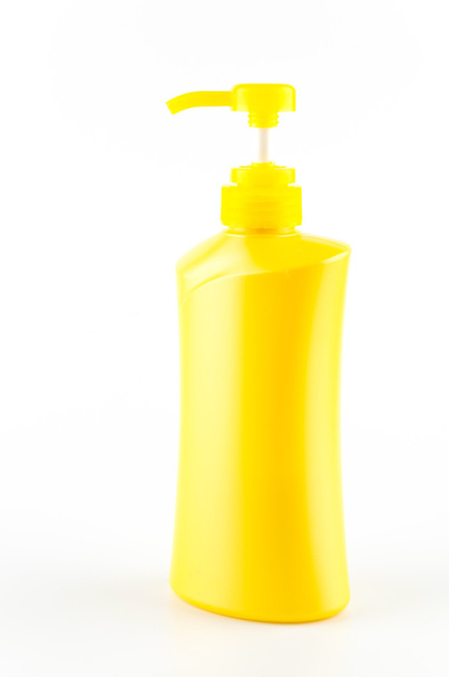 Yellow bottle pump - Фото, зображення