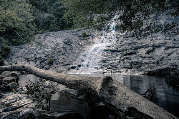 A small waterfall in nature - Φωτογραφία, εικόνα