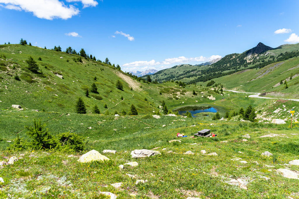 A beautiful view of green-covered hills of Col de Vars in Hautes Alpes, France - Photo, image