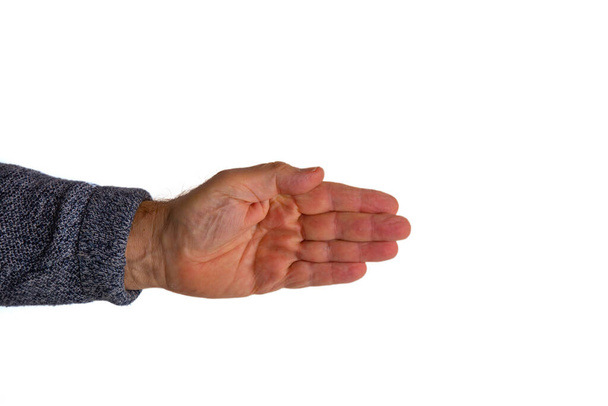 A closeup shot of the left hand of a man with stretched out closed fingers on a white background - Photo, Image