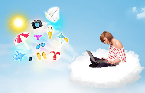 Young businessman sitting in cloud with laptop - Foto, Imagem