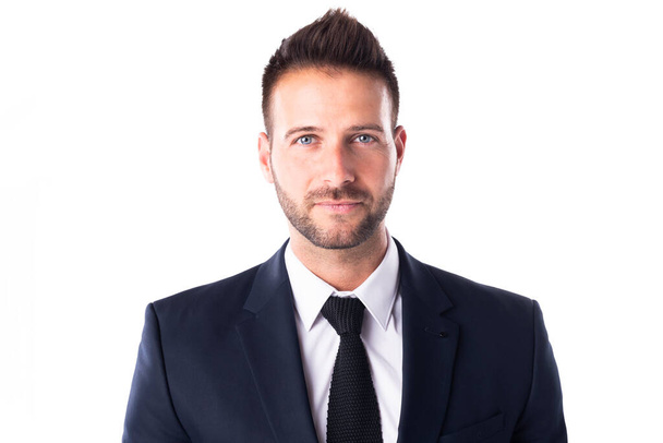 Handsome businessman portrait while standing at isolated white background. Copy space.  - Foto, Bild
