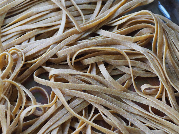 drying homemade egg noodles from wholemeal flour - Photo, Image