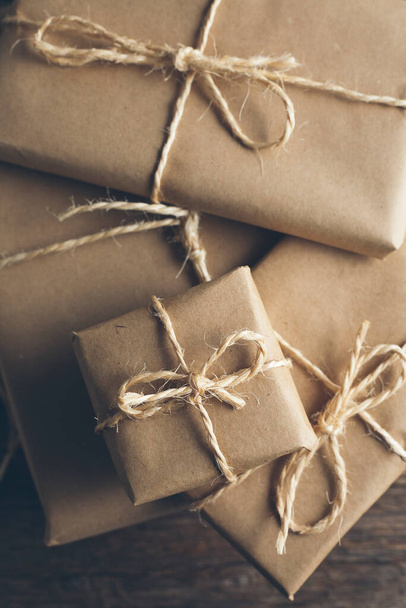 Packages wrapped in kraft paper tied with jute - Photo, Image