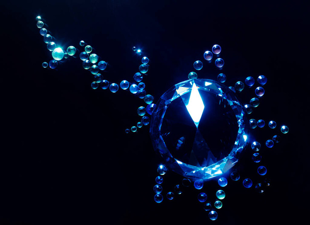 Photo of a luxury gemstones laying on surface in flower shape on black background. - Φωτογραφία, εικόνα