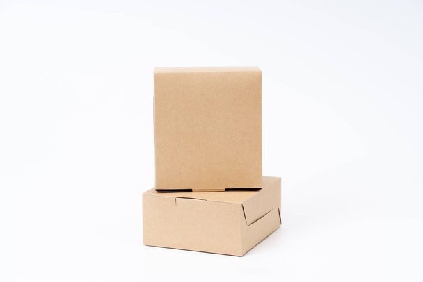 Brown paper box for food package. carton on a white background. - Fotó, kép