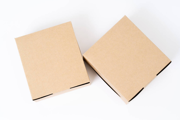 Brown paper box for food package. carton on a white background. - Foto, imagen