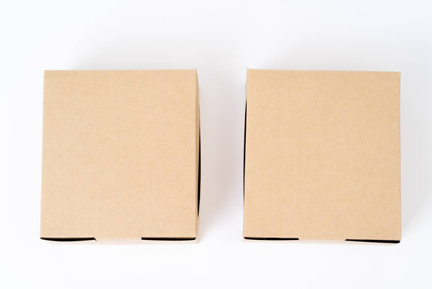 Brown paper box for food package. carton on a white background. - Valokuva, kuva