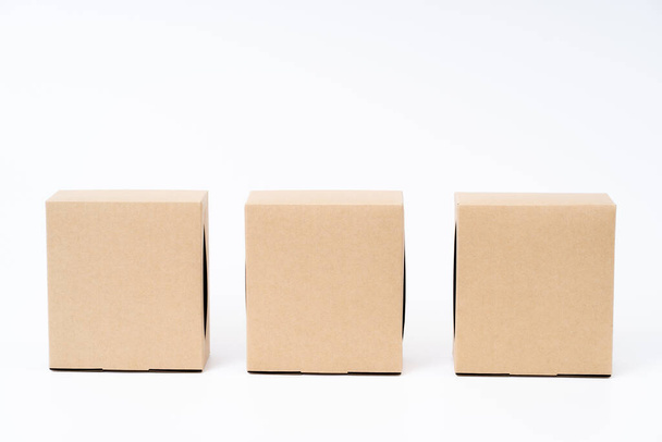 Brown paper box for food package. carton on a white background. - 写真・画像