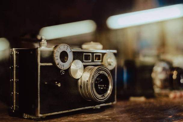 Vintage film camera, collectibles. retro photography equipment. vintage color tone. - Фото, зображення