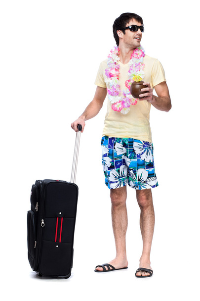 Full length of young man with travel bag - Foto, immagini