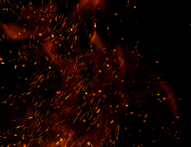 flammes de feu avec étincelles sur fond noir - Photo, image
