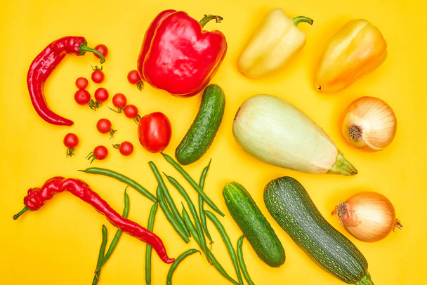 vegetables on yellow background, flatlay one - Foto, afbeelding