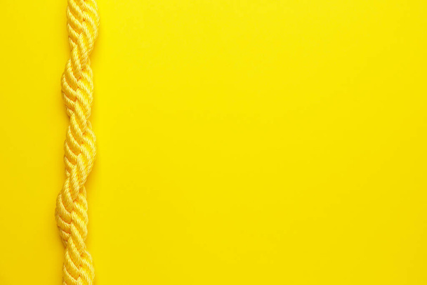 Long rope on color background - Photo, Image