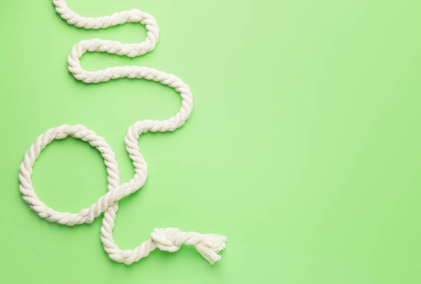 Long rope on color background - Photo, image