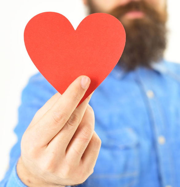 Valentines day concept. Card in heart shape in hand - Foto, Bild