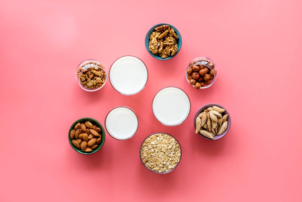 Almond, hazelnut, walnut oat milk in bottles - top view - Photo, Image