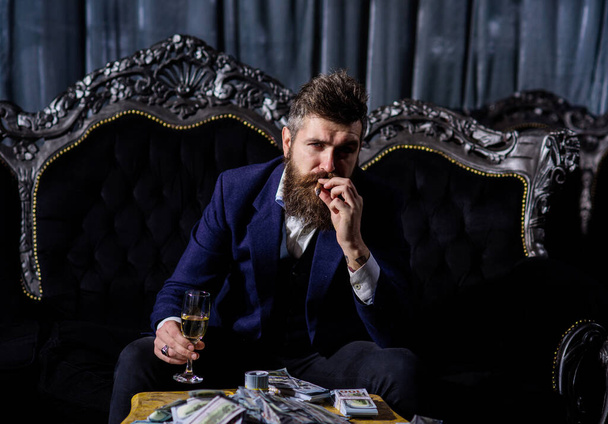 portrait of young handsome business man in retro mens club - Photo, Image