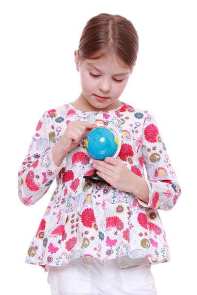 Girl with the globe in hands - Foto, Imagen