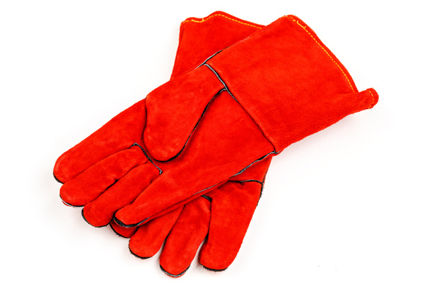Зварювальні рукавички, зварювальне обладнання, рукавички ізольовані на білому тлі, захисний одяг
. - Фото, зображення