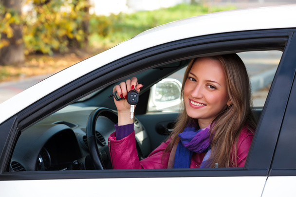 Woman Showing The Key Of Her New Car - Photo, Image
