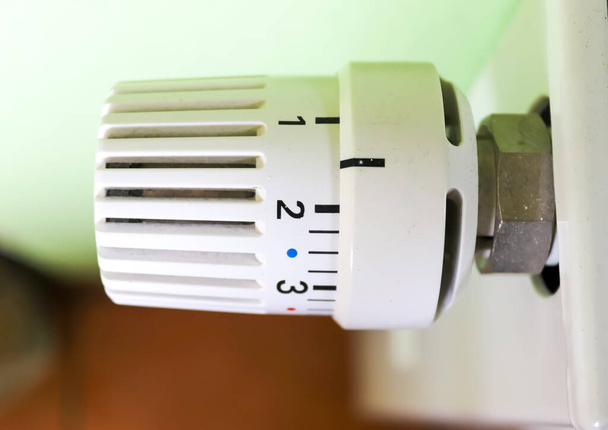 A macro closeup shot of a thermostat from a heater appliance - Fotó, kép