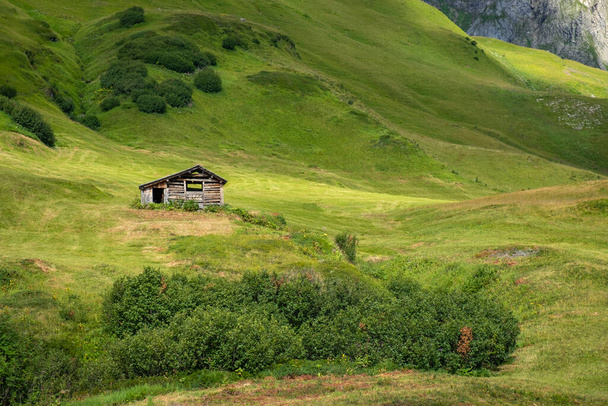 old wooden houses in the Alps at the Seekopf mountain in Vorarlberg, Austria - Valokuva, kuva