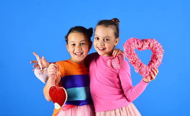 Children celebrate Valentines day. Love and valentines party concept - Photo, Image