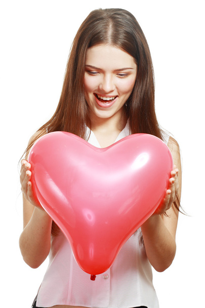 Woman holding red heart balloon - Foto, Bild