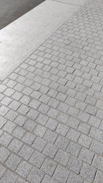 Fragmento del pavimento, acabado con piedra pulida agraciada - Foto, imagen