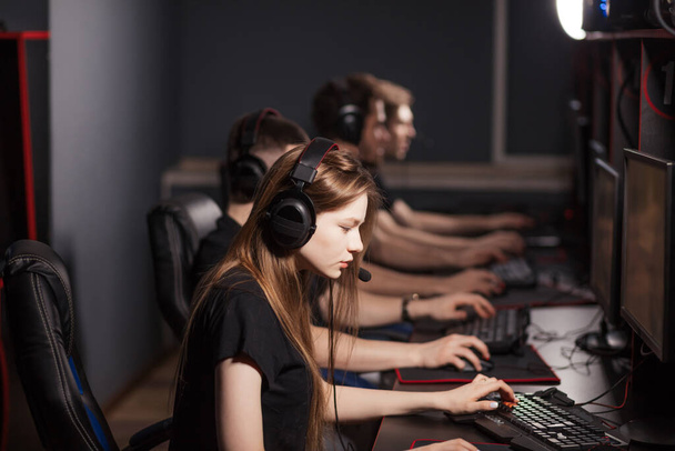 Team of eSport Gamers Playing Video Games on a cyber games contest. - Zdjęcie, obraz