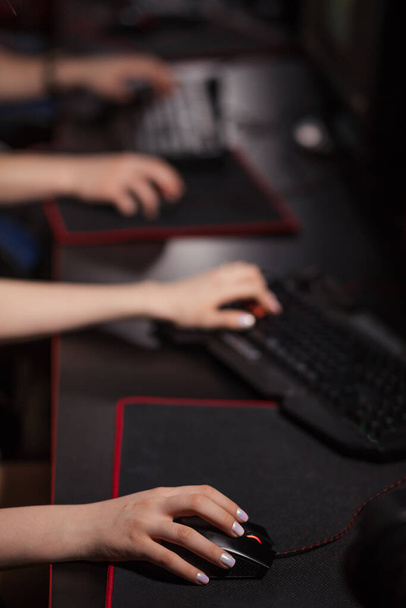 Close up gamers hands pushing buttons on keyboards, working, betting, playing. - Foto, Imagem