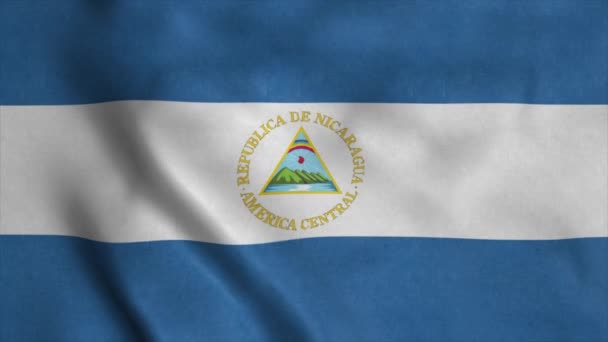 Η σημαία της Νικαράγουας κυματίζει. Εθνική σημαία Δημοκρατία της Νικαράγουα. 4K - Πλάνα, βίντεο