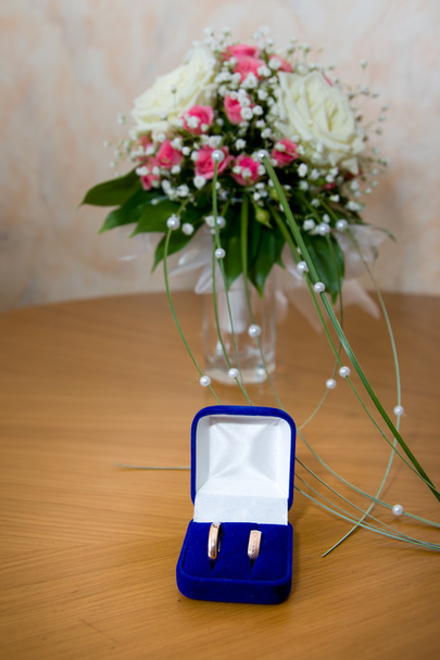 Wedding rings and bouquet - Photo, Image