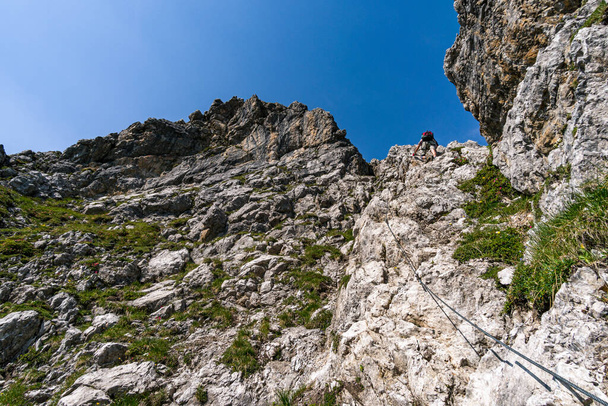 Climbing the Karhorn Via Ferrata near Warth Schrocken in the Lechquellen Mountains in Vorarlberg Austria - Фото, изображение