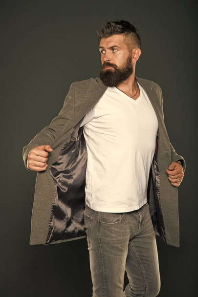 Menswear. Hipster wear comfy outfit. Caucasian man with brutal appearance. Bearded man with moustache and beard on unshaven face in brutal style. Brutal hipster wearing casual outfit. Clothes shop - Foto, Imagem