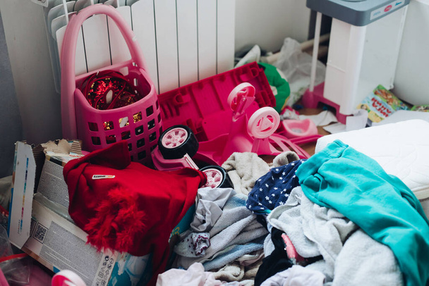Picture of a girls childrens room with a strong mess - Photo, Image