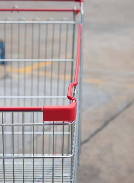 Close up of Shopping cart in parking areas, shopping malls. - Photo, image