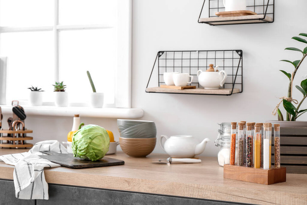 Set of utensils and products on kitchen counter - Valokuva, kuva