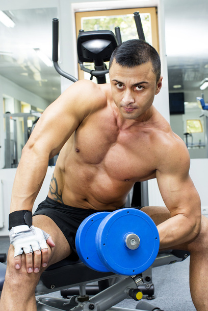 Young man training in the gym - Photo, Image