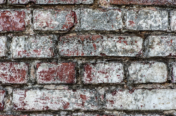 Eine alte Ziegelmauer. Abstrakter Hintergrund mit Ziegelstruktur. - Foto, Bild