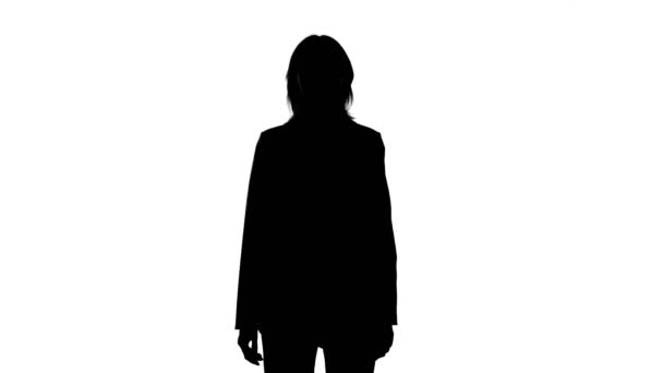 Video von schulterzuckenden Frauensilhouette in Anzugsjacke - Filmmaterial, Video