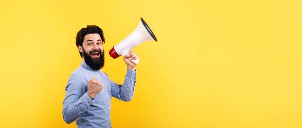 hipster man with megaphone over yellow background, success concept, panoramic mock-up - Photo, Image
