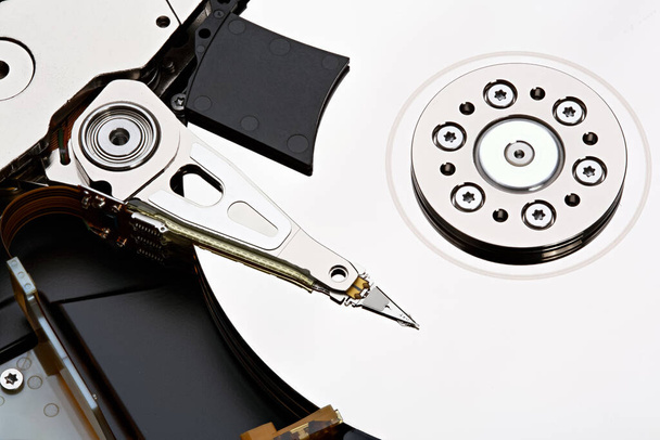 Hard disk drive inside. Data safety concept. Stacked photo. - Photo, Image