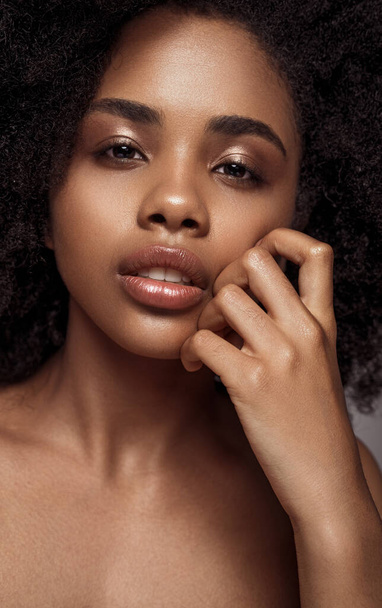 Beautiful black female with makeup - 写真・画像
