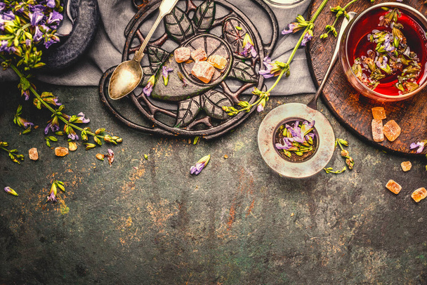 Healthful herbs tea setting on rustic background, top view, border - Photo, Image