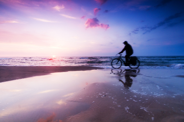 Healthy lifestyle, beach at sunset - Zdjęcie, obraz