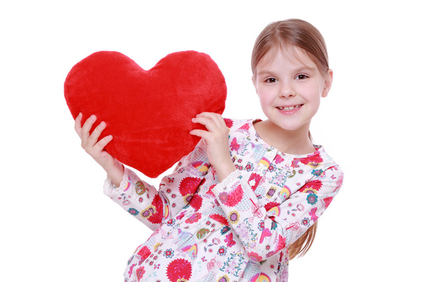 Young girl with huge red heart - Φωτογραφία, εικόνα